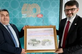 ditib_istisare_toplantisi_40_yil_tablo_hediye